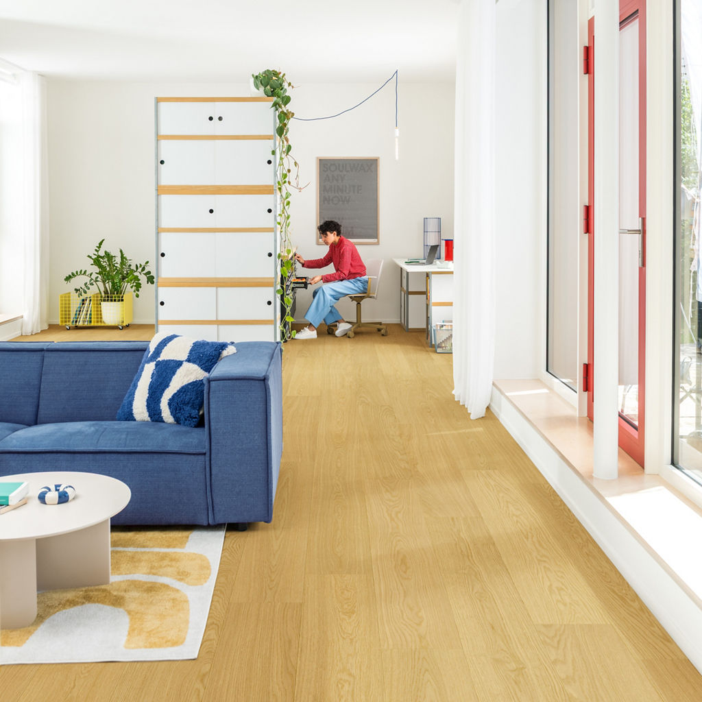 Quick-Step Impressive AC4/32 8 mm Roble Bourbon IM8260 - ambiente