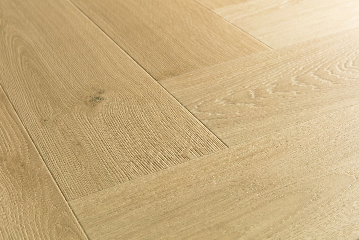 Textura de la superficie del suelo laminado Quick-Step Impressive Design Roble Cardamomo