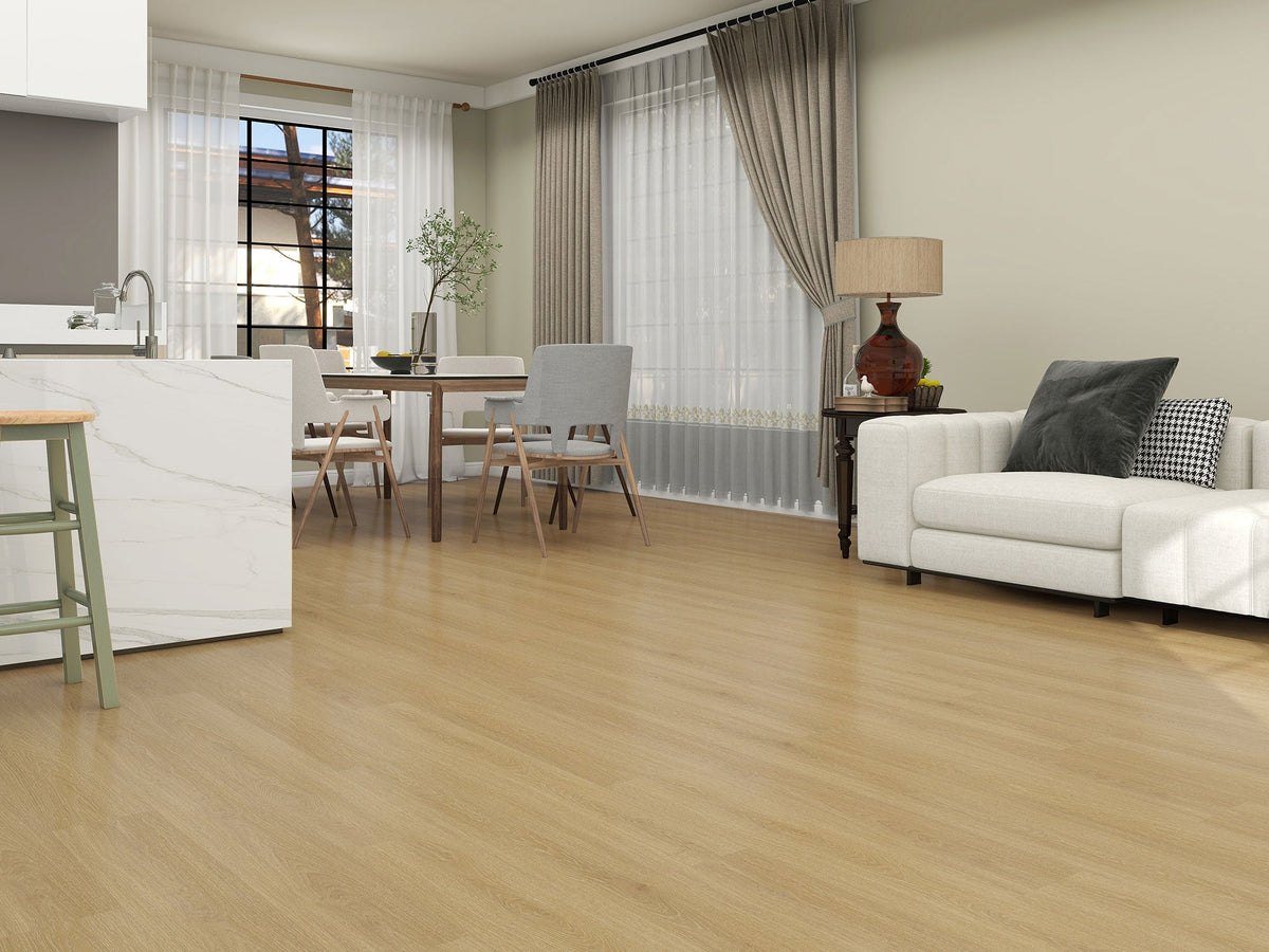 Cocina blanca abierta al salón con suelo SPC de madera clara