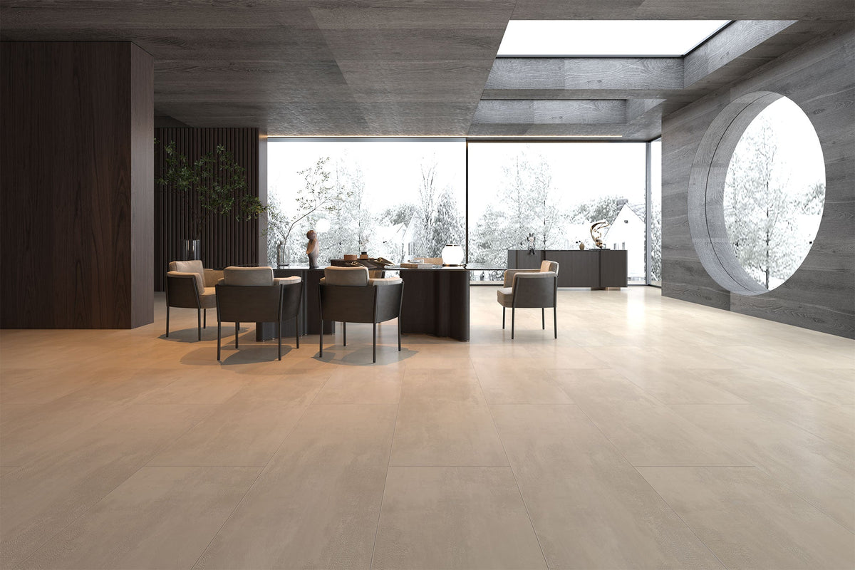 Espacio moderno con suelo SPC Materia Stone Nácar, ventanal circular y comedor minimalista
