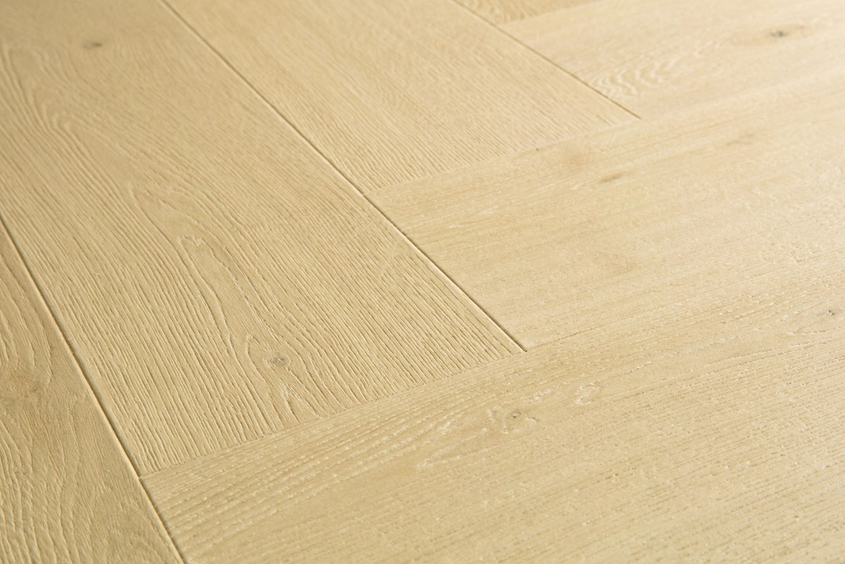 Textura de la superficie del suelo laminado Quick-Step Impressive Design Roble Jengibre